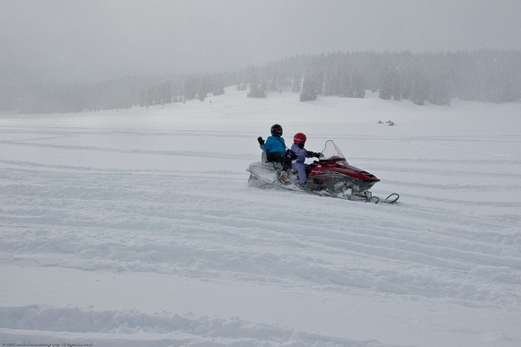Elizabeth & Emma Snowmobiling in Routt National Forest