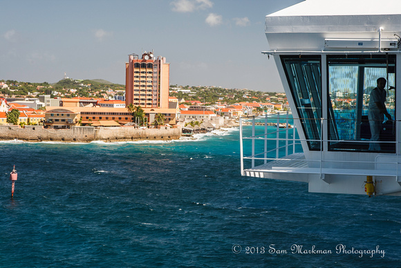 Carnival Breeze's Bridge towers over Curacao's Plaza Hotel and historic Waterford Forte!