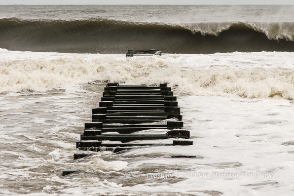 Waves pound the Rehoboth Beach jetty at Maryland Avenue