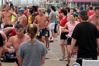 Swimmers either hand off to a runner or do a quick change into running gear