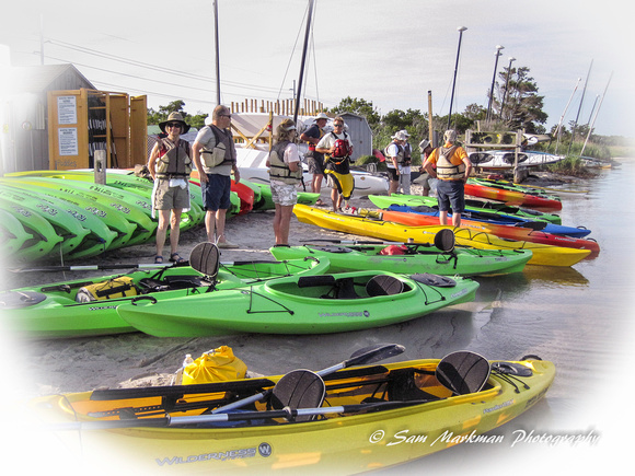 Coastal Camera Club members gather before launching kayaks.