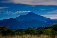 Volcano Photographed Through the Bus Window